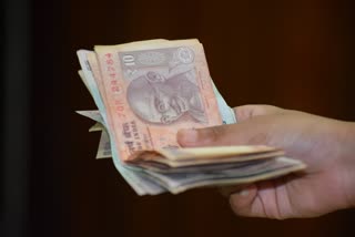 rupee at one month high against dollar