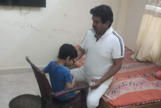 Dewas MP Mahendra Singh Solanki did the hair cutting of his sons