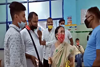 TWO ISLAM YOUTH DONATING BLOOD TO A HINDU ELDER PERSON