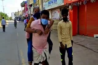 A man carried his mother on his back to hospital for 2 kms.