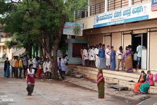 Private Hospital Forgiving Social distance: Long line of people to got token