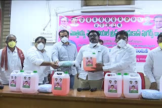 minister puvvad Ajay And mp nama nageshwara rao distribution masks and sanitisers in kammam