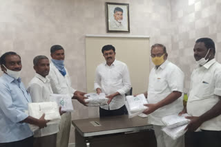 telugudesham party masks distribution