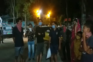 laborers wandering in the night under lockdown