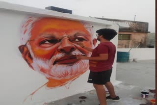 PM Modi's picture made on the wall