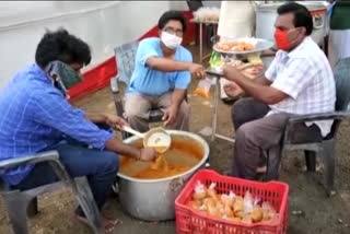 Distributing food to emergency service personnel in mailavaram