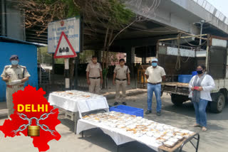 RPF soldiers distributed food to the destitute at the railway station during lockdown