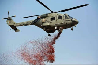 IAF chopper showers flower petals on Gandhi Hospital in Hyderabad