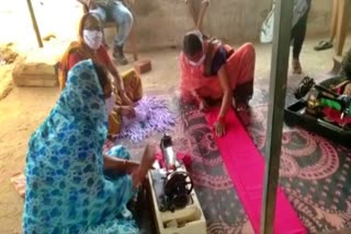 members-of-women-self-help-group-making-masks-in-bijapur