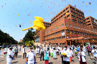 Armed forces pay tribute to corona warriors as helicopters fly past hospitals in visakhapatnam