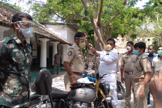 face shield distribute to police in narasapuram west godavari district