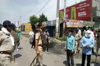 migrant laborers pelted stones at police