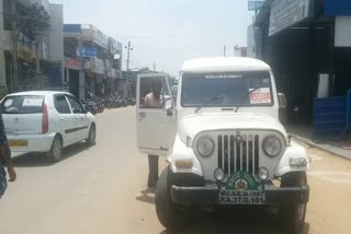 government-vehicle-driver-in-wine-shop