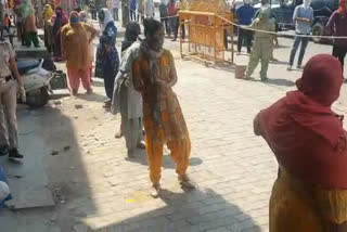 Long queues of Women outside liquor shops in Delhi