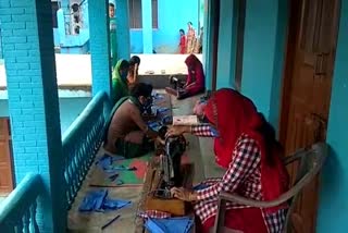 BJP workers preparing masks