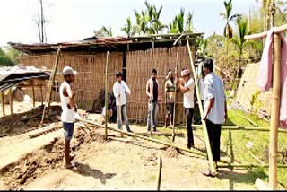 a social worker youth build house for a storm affected family