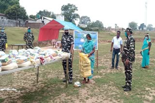 CRPF jawans are distributing ration in bokaro