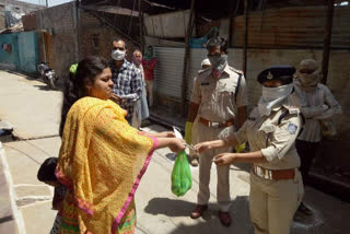 Kiosk operator distributed masks and sanitizers to customers in raisen