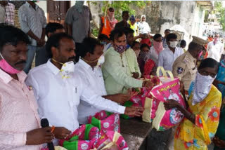 mla aroori ramesh distributed daily commodities