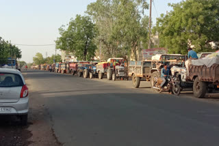 Long queues of vehicles continued on roads outside of procurement centre