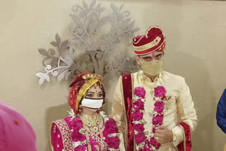 A couple in Ahmedabad get married with masks on, handful of guests