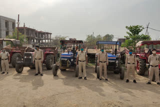 tractors seized due to Transporting sand illegally