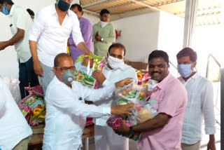 mla gandhi distributed daily commodities to joutnalists