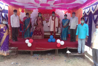 Married wearing a mask in Madikeri