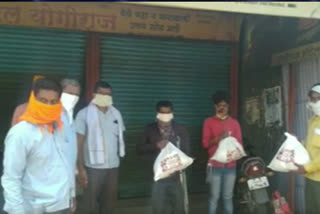 bjp mp prataprao chikhalikar distributed grain