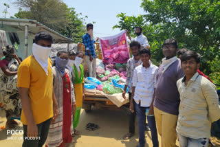 wellwishers team distributing essential goods to poor people in narasannapeta