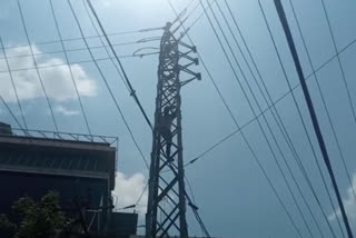 a person protest on power pole at moglarajapuram