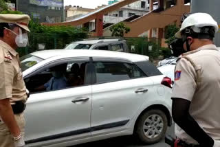 Rajouri Garden police examining body temperature with thermal corona combat headgear