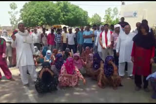 protest against wine shop in sundana village rohtak