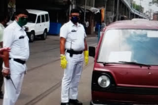 Policemen stood with traffic police in kolkata