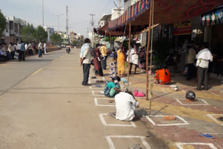 peopke standing infront of banks  and place their onn things in anantapur dst