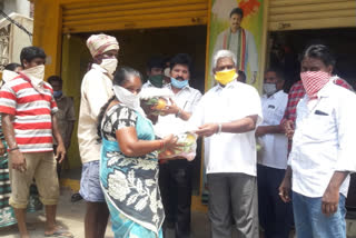 masks eggs distributed to panchayati staff by tdp leaders at tanuku in west godavari district