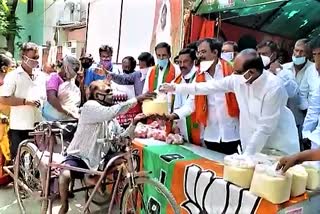 bjp-laxman-distribute-groceries-at-secendrabad