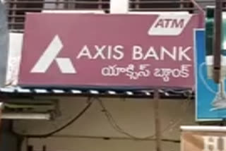 theft ib axis bank atm in mallepalli