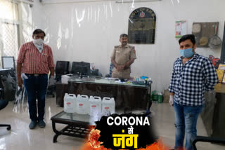 madhu vihar thana police geting senetizer for safety to corona virus in delhi