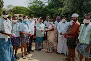 mask distribution to upadhi haami labours