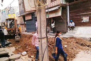 construction work resumed in sangam vihar after some relief in lockdown