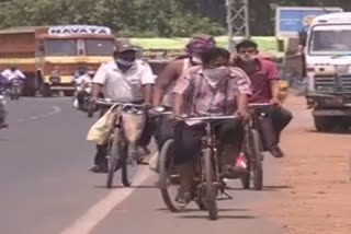 labours on cycle from vijaywada