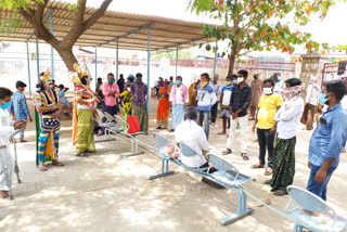 teacher giving awareness on corona in kalyanadurgam