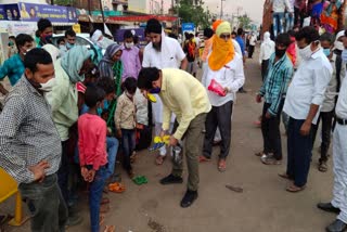 Slippers given to migrant laborers in raipur