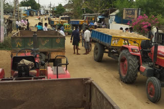 The tractors were blocked in  China Thandrapadu Gadwalla district