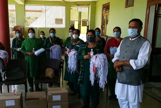 Rajeev Bindal distributes mask