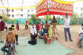 migrants waiting for checkup