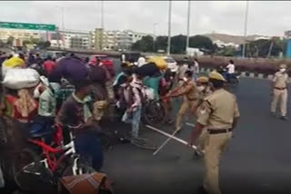 Migrant Labourers Guntur Andhra Pradesh Jagan Mohan Reddy Vijayawada Police Lathi Charge അമരാവതി ഗുണ്ടൂർ ജില്ല അതിഥി തൊഴിലാളി ആന്ധ്രപ്രദേശ് മുഖ്യമന്ത്രി വൈ.എസ്. ജഗൻ മോഹൻ റെഡ്ഡി