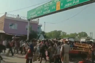 Migrant workers break police barricades at Uttar Pradesh-Madhya Pradesh border