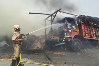 overloaded lorry with straw took fire on road in east burdwan